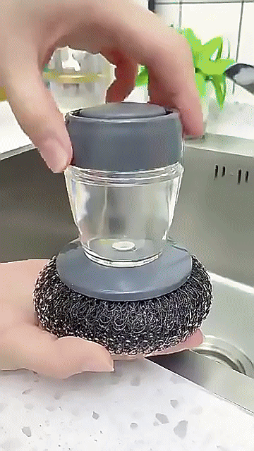 فرشاة غسل الأواني المضافة السائلة