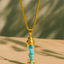 Gold - Tone Cylinder Stone Pendant Necklace - Zambeel