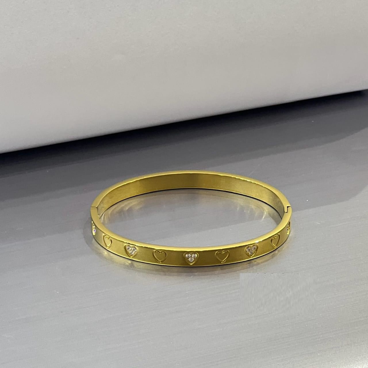 Heart Engraved Silver Bangle - Zambeel