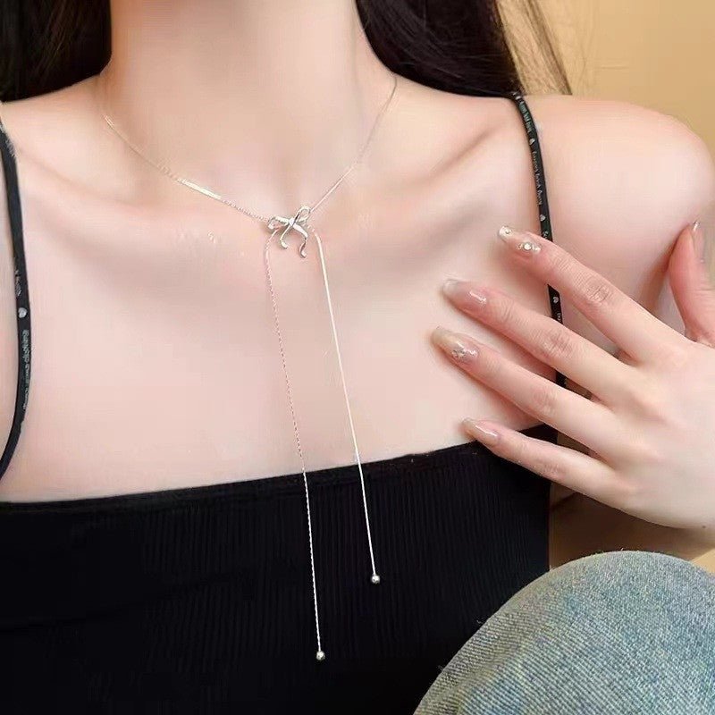 Long Bow Tie Tassel Pull Necklace For Women - Zambeel